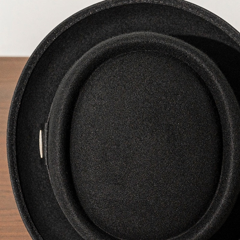 Black Felt Rolled Brim Top Hat with Webbing Decoration