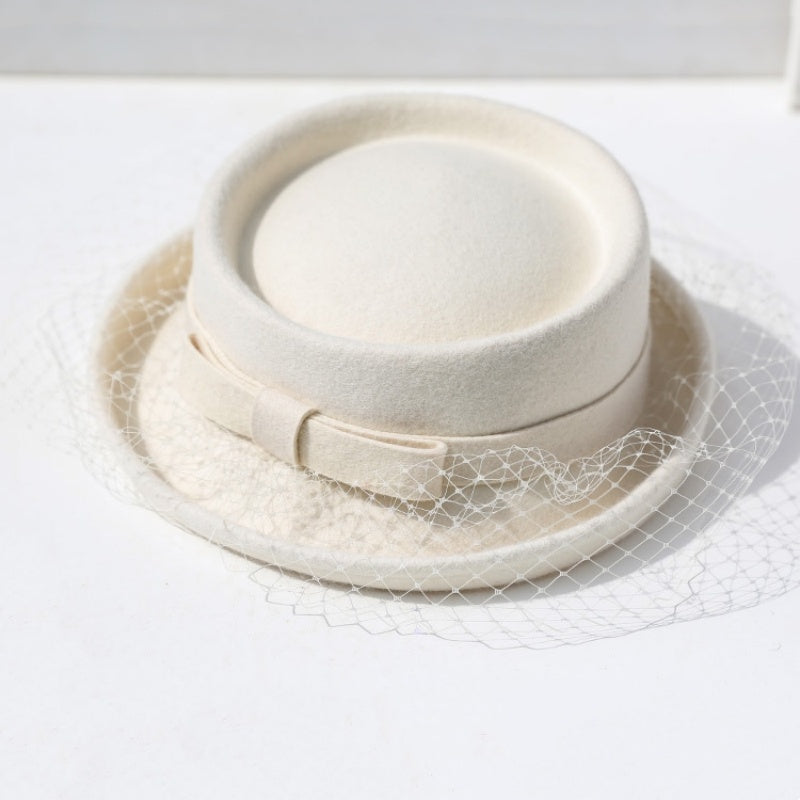 Felt Rolled Edge Top Hat with Veil and Bow