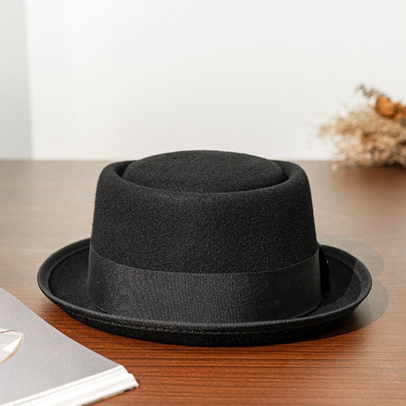 Black Felt Rolled Brim Top Hat with Webbing Decoration